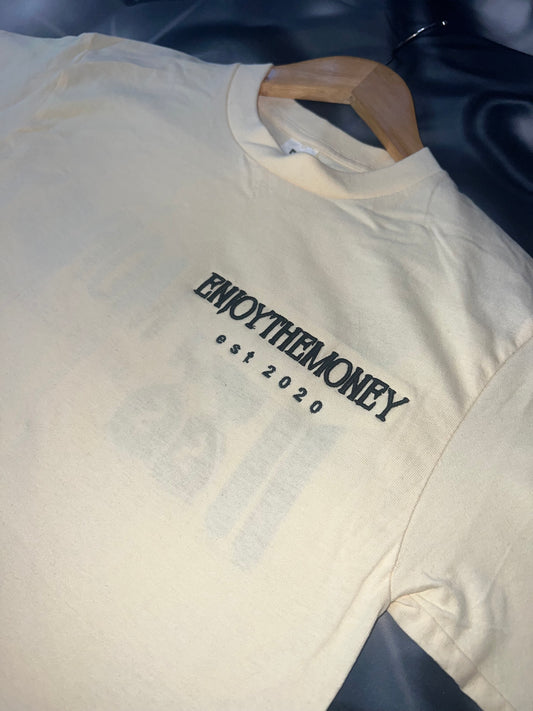 ENJOY THE MONEY GRAPHIC TEE(PALE YELLOW)